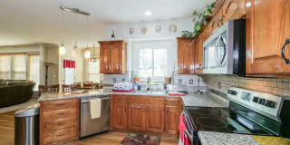Beautiful 5 Bedroom 4.5 Bathroom Olathe Home with Finished Basement, 3-Car Garage & Flexible Furnished or Unfurnished Living Options Gallery 12