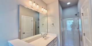 **OFFERING REFUNDABLE APPLICATION FEES** Modern 2BD, 2.5BA Raleigh Home Located in Brier Creek Near Tons of Shopping and Dining Options & Within Close Proximity to RDU and RTP Gallery 11