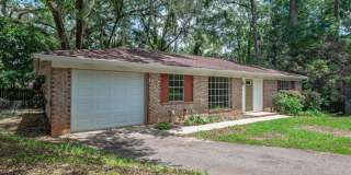 GORGEOUS NW 3/2 on w/ Fenced Yard, Garage, Stainless Steel Appliances, & MORE! Avail Now for $1800 per month! Gallery 1