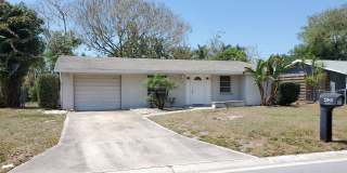 CHARMING 2 BEDROOM 2 BATHROOM + LARGE SUNROOM SINGLE FAMILY HOME WITH A ONE CAR GARAGE LOCATED IN THE HEART OF SARASOTA! Gallery 1