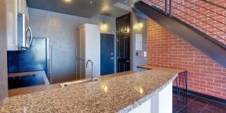 Move in ready modern loft condo in Uptown Charlotte just seconds to all the action. Gallery 7
