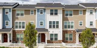 Spacious 4-Bedroom Townhome with Guest Suite, Modern Finishes & Prime Herriman Location Gallery 1