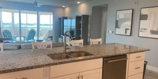 Coastal Luxury at Hidden Bay | 3BR Waterfront Condo with Bay Views Gallery 9