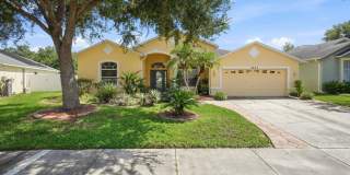 Spacious 4 Bedroom, 3 Bath Pool Home in the Highly Desirable Stagecoach Village Community of Land O' Lakes Gallery 1