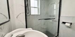 Top-Floor 2 Bedroom Condo in Gated Community with Huge Balcony & Elegant Marble Bath Gallery 10