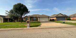 4 bed, 2 bath, 2 car garage, 12-14 person Storm Shelter Gallery 1