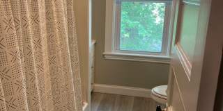 Huge 4 bed 3 bath Bi level unit near the Red Line and Commuter Rail in Quincy! Gallery 1