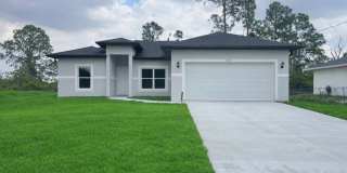 NEW CONSTRUCTION-Spacious 4 Bed / 2 Bath / 2 Car Garage Home in Lehigh Acres Gallery 1