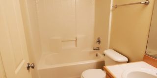 Great Location! 2 Bed 2 Bath Townhouse Style Condo! Open Concept! Laminate Floors Throughout Main! Gallery 21