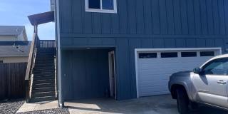2 Bedroom 1 bath house with extra large double car garage and extra storage space! Gallery 1