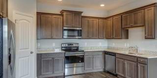 Fairview Station Charmer!  Perfectly comfortable 4/2.5 family home close to Westwood Elementary. Gallery 9