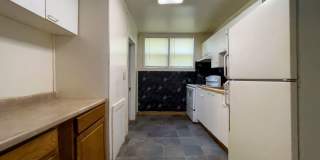 Fall into this cozy 3-Bedroom Home with a fenced in yard & detached garage! Gallery 12