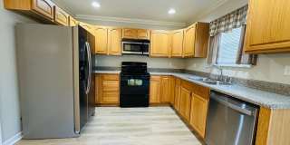 2 bed, 2.5 bath updated townhouse w/ 1-car garage & Trex deck available now Gallery 7