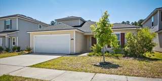 Beautiful Open Layout 4 Bed, 3 Full Bath | A True Masterpiece Backing to a Peaceful Pond with Modern Upgrades + Tesla Charging Gallery 3