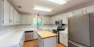 Scenic Brook West Sanctuary: Well-Maintained Home with Expansive Backyard Gallery 11