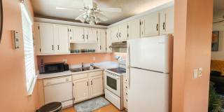 Coming Soon! Beautifully furnished 1 bedroom 1.5 bath condo Gallery 12