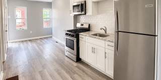 Bright 2-Bedroom Home with a Stylish Kitchen & Central Air Bright 2-Bedroom Home with a Stylish Kitchen & Central Air Gallery 1