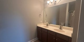 Don't miss this 4-bed, 3-bath condo TWO miles from the ocean! Gallery 30