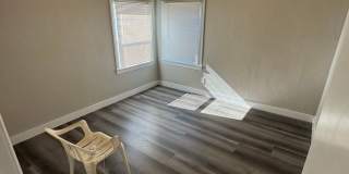 BEAUTIFUL UPDATED DUPLEX 2 BED & ONE BATH! Gallery 12