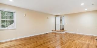 5 BR 4.5 BA home with inground heated pool and extensive hardscape! Gallery 37