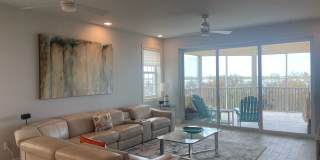 Coastal Luxury at Hidden Bay | 3BR Waterfront Condo with Bay Views Gallery 11