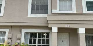 Beautiful Townhome in a gated community with assigned parking spots and a community pool Gallery 1