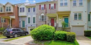 Updated 4 level TH w/ 2 FB & 2 "1/2" baths + One car garage! Gallery 1