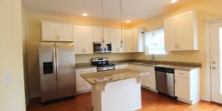 Spacious 3 Bedroom, 3.5 Bathroom Townhome with Finished Basement, Fenced Yard & Garage Gallery 12
