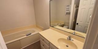 Beautiful 4BR Home with New LVP Flooring & Lawn Care Included Near The U of A! Gallery 16