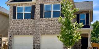 Welcome to this Almost New 3 Bed/2.5 Bath Home in Lovejoy! Gallery 1