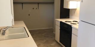 Clean & Move-In Ready 2-Bedroom Home with Garage and Large Fenced Yard Gallery 3