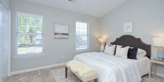 Discover this beautifully updated Raintree townhome featuring an open floor plan and a range of contemporary enhancements. Gallery 17