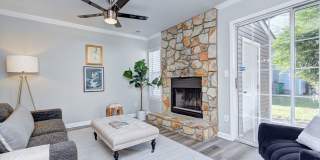Discover this beautifully updated Raintree townhome featuring an open floor plan and a range of contemporary enhancements. Gallery 13