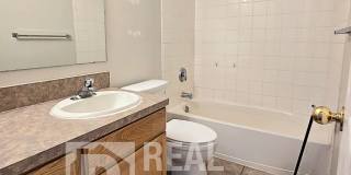 Spacious & Updated 2 Bedroom, 2 Bathroom Twin Home in Ammon with Garage, Fenced Backyard, and Hookups (Idaho Falls) for Rent by Real Property Management Gallery 6