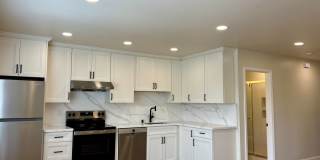 Light, bright & all NEW inside. Beautiful upgrades in this naturally bright 2 bd, 1 ba unit with a huge garage. Gallery 1