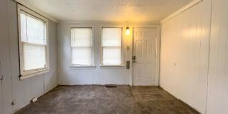 For Rent: 912 S Penn St. Cozy 3-Bedroom Home with a fenced in yard & detached garage! Washer & Dryer Hookups! Section 8 Approved! Gallery 4