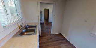 Available Now! Single Family 1/1 home for lease with large lot and 1 car garage! Gallery 4
