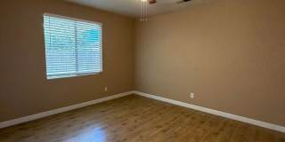 Spacious 3 Bedroom, 2 Bath Tevis Ranch Home with Fireplace, Covered Patio & 2-Car Garage Gallery 7
