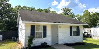 Great location, close to everything, private setting, large rooms, tile floors, huge kitchen, must see! Gallery 1