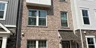 Luxury 3BR Townhome in Shipley Homestead | Quartz Kitchen, Fireplace & 2-Car Garage Gallery 1