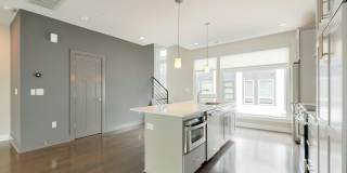 Stunning South End end unit townhome in the modern and amazing Southpoint community. Gallery 14