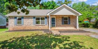 Charming Brick Ranch with Spacious Living Areas & Beautiful Bay Window Views! Gallery 1