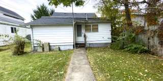 Fall into this cozy 3-Bedroom Home with a fenced in yard & detached garage! Gallery 22