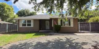 RENOVATED 3-BEDROOM HOME WITH FLEX SPACE, GARAGE & HUGE FENCED YARD Gallery 1