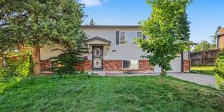 Spacious 3BR/2BA Centennial Home with Finished Basement & Extra-Large Fenced Yard Gallery 1