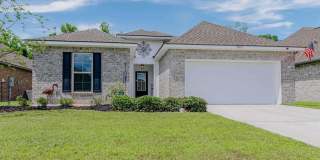 Modern 3 Bedroom Home with Private Backyard Views in Forestwood Gallery 1