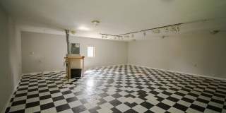 Bright, beautiful home with 3 garage spaces & tons of storage! Gallery 7