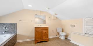 Spacious 2BR/2.5BA Townhome with Finished Basement & Extra Storage Gallery 33