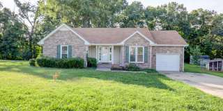 Amazing Brick Front Ranch Home With Hardwood Flooring and Fireplace Gallery 1