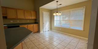 Fenced in back yard! Split bedroom floor plan! Pets are owner's approval, fees do apply. Gallery 13
